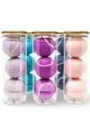Pastel pink, purple, blue, lavender and navy blue tennis balls